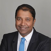 Headshot of Madhav Thambisetty